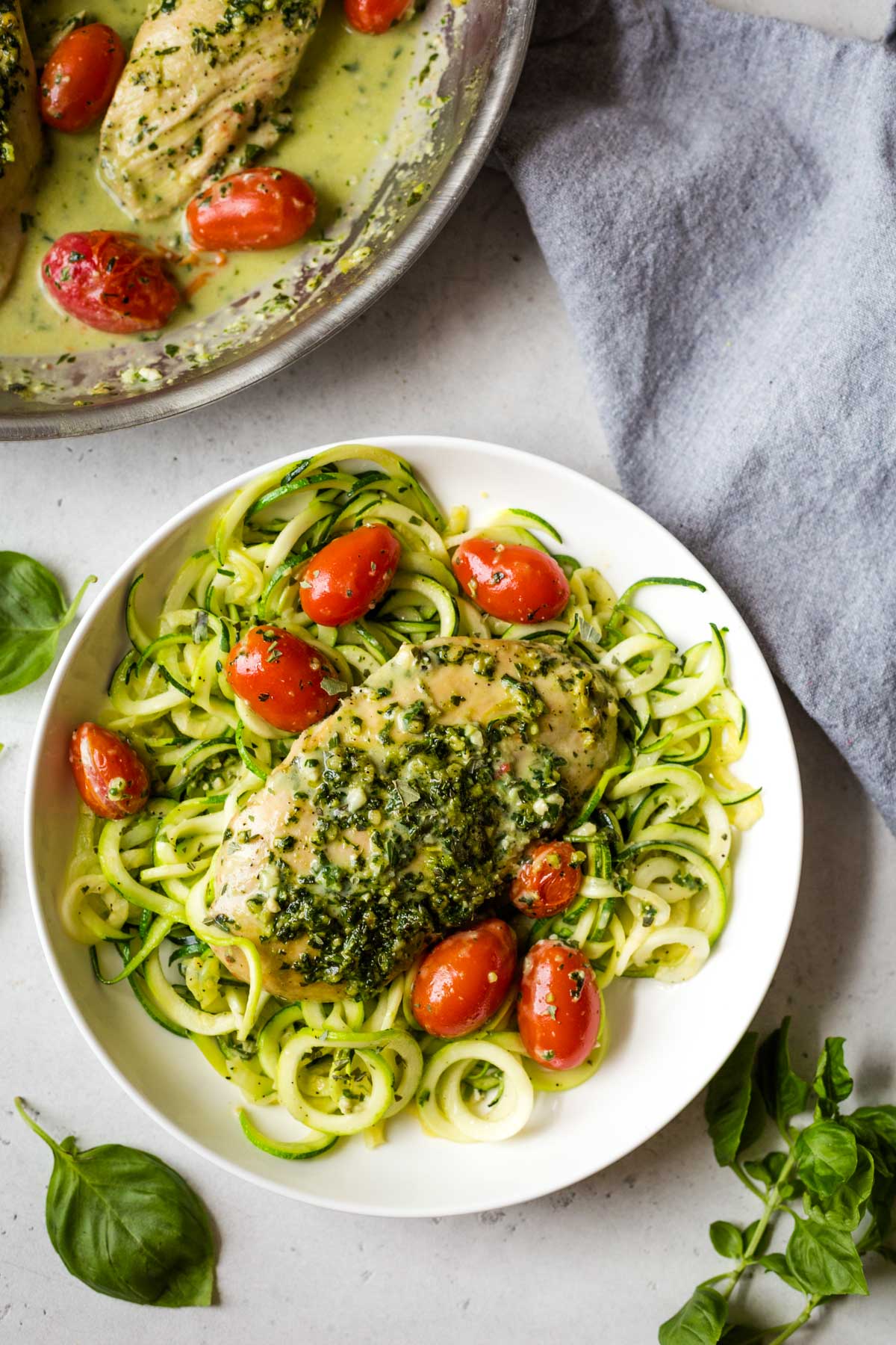 Pesto Chicken with zucchini noodles and grape tomatoes